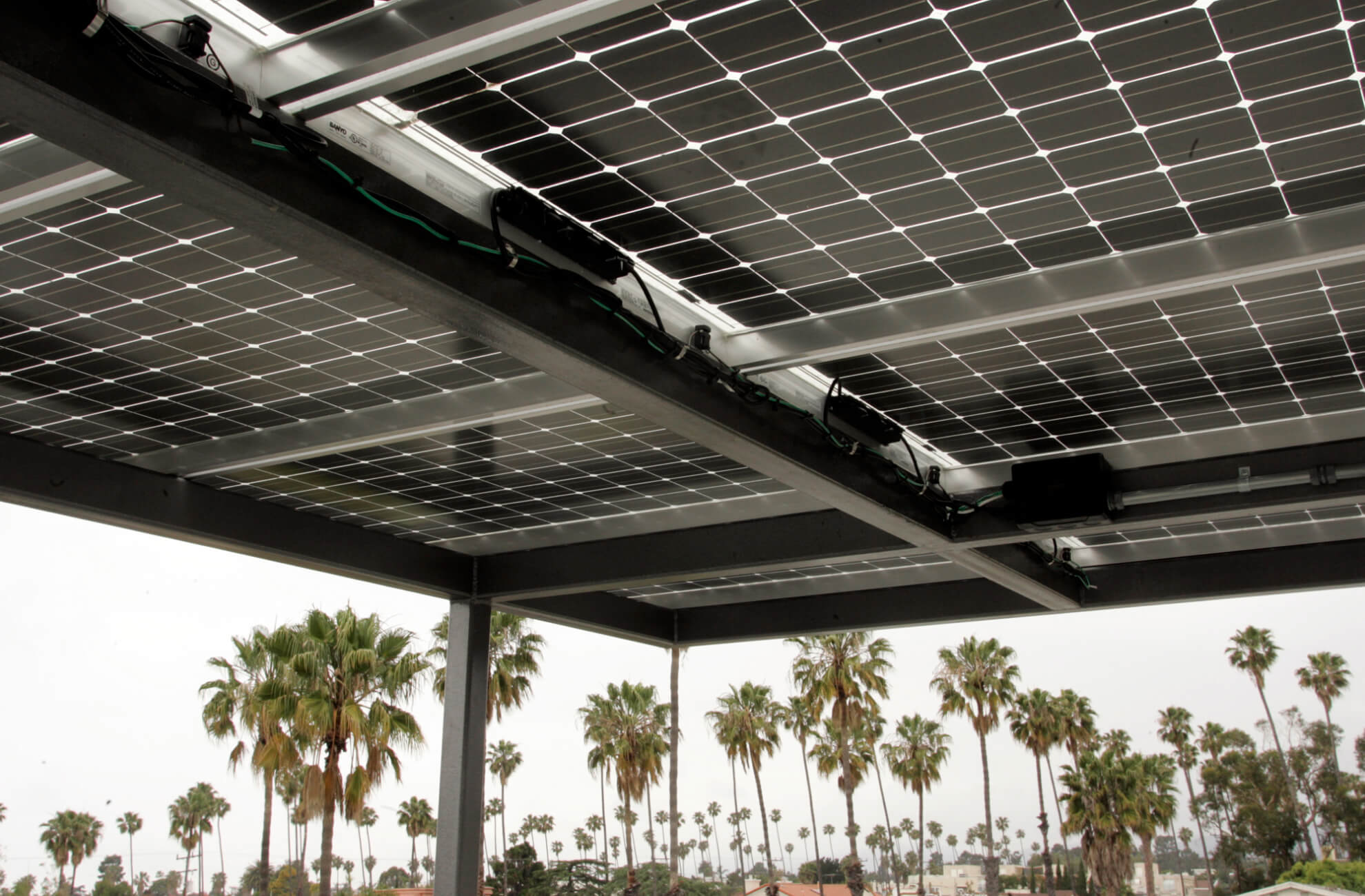 Solar panels on the roof of a unit in a townhome project in California.
